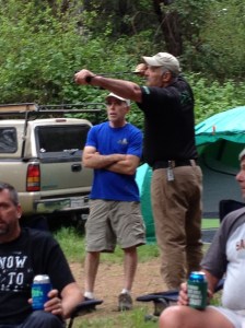 Randy shooting arrow in sling